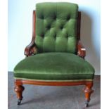 Victorian mahogany lady's button-back chair with downswept arms, cushioned seat, raised on on