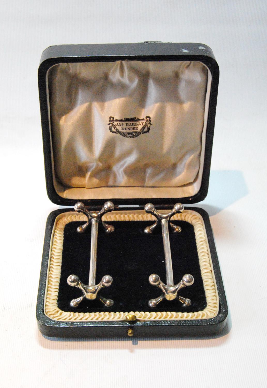 Pair of silver knife rests, quite plain, by Harry Atkin, Sheffield 1920, cased, 2oz, 63g.