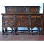 Edwardian oak sideboard, with panelled back board, moulded rectangular top over three short drawers,