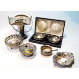 Pair of silver bon-bon dishes, cased, another four, one with swing handle, and a toddy ladle bowl,