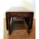 19th century mahogany plum pudding dining table, the reeded, rounded rectangular drop-flap top