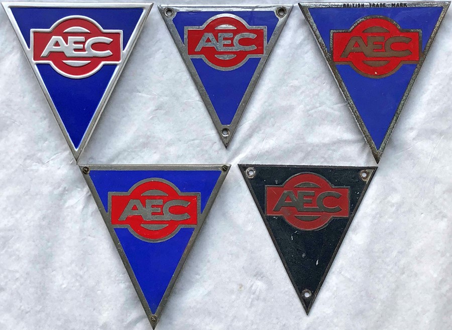 Selection (5) of metal AEC RADIATOR TRIANGLE BADGES of various types from buses or lorries etc,