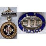Pair of railway MEDALS/BADGES comprising a Great Western Railway (GWR) 25 years First Aid Efficiency