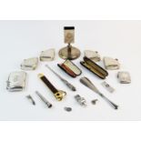 A selection of Gentlemans silver smoking accessories, to include; a George V matchbox holder, Synyer