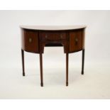 A George III style mahogany bow front sideboard of small proportions, the single convex frieze