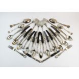 A Victorian silver Kings pattern canteen of cutlery, comprising: seventeen dinner forks (four