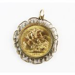 An Elizabethan sovereign, dated 1966, set to a 9ct gold scroll design pendant mount, 3cm total