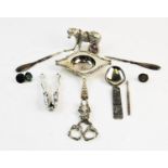 A selection of silver and silver coloured items, to include, a George V silver tea strainer,