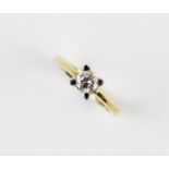 A diamond solitaire ring, the central brilliant cut diamond measuring approx. 0.25ct, claw set in