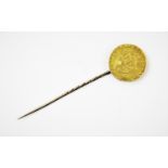 A George III half gold spade guinea dated 1793, with attached soldered pin fitting,