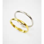 A 22ct gold wedding band, Birmingham 1936-37, size O, gross weight approx. 1.9gms, with a further