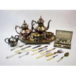 An American Oneida four piece silver plated tea service, an EPBM spherical teapot with flame finial,