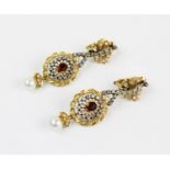 A pair of continental diamond and pearl set garland drop earrings, the pierced oval garland form