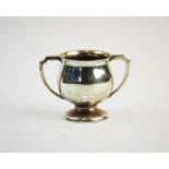 A George V silver miniature trophy, S Blanckensee & Son Ltd, Chester 1934, of typical twin handled