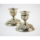 A pair of Victorian silver boudoir candlesticks, Horace Woodward & Co Ltd, London 1900, each of