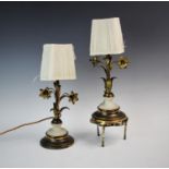 A pair of early 20th century gilt metal and alabaster table lamps, each modelled as a lily with