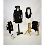 A collection of naval interest dress and other uniforms, early 20th century, comprising; three