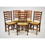 A set of ten 18th century style honey oak ladder back dining chairs, 20th century, each chair with