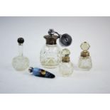 A selection of silver and white metal topped bottles, to include; two silver topped perfume glass