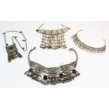 A selection of Yemeni-style wedding jewellery, to include a white metal fringed collarette with