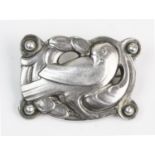 A Georg Jensen silver dove brooch, the pierced design brooch measuring 3cm x 2.2cm, hinged pin and