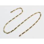 A 9ct gold figaro link chain, 51cm long, lobster claw and loop fastening stamped '375' and '9K',