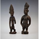 Two West African Nigerian Ibeji doll twin figures, one with glass trade bead necklace, the tallest