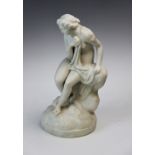 A Parian Ware figure modelled as a neoclassical nude bather seated on a rock, 28cm high
