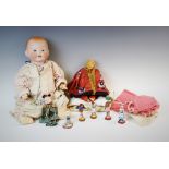 An early 20th century Armand Marseille bisque head doll, stamped 'A.M Germany 351.14K', with