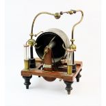 A Victorian Wimshurst electrostatic generator, of typical composition with two contra-rotating