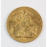 A George V sovereign, dated 1913, weight 8.1gms