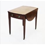 A Regency mahogany Pembroke table, the oval drop leaf top above a single frieze drawer applied