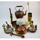 A collection of early 20th century later brass wares, to include, three copper coloured moulds,