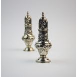 A pair of Victorian silver sugar casters, William Aitken, Chester 1900, each of baluster form,