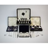A selection of cased silver and silver plated items, comprising: a cased silver condiment set,