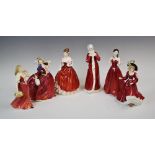 A collection of six Royal Doulton figurines, comprising: HN1934 Autumn Breezes, HN4091 Molly, HN3060