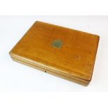 A Victorian oak brass inlaid converted pistol box, hinged cover enclosing a fitted interior and late
