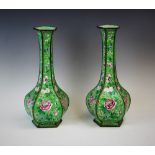 A pair of Chinese cloisonne vases, early 20th century, each of faceted tapering gourd form,