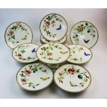 A Victorian English porcelain part dessert service, each piece finely enamelled with butterflies