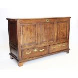 A George III oak mule chest, the rectangular moulded and hinged top above three cross banded