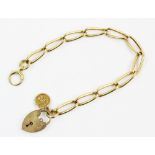 A 9ct gold charm bracelet, the trombone link chain with spring-ring fastening, 22cm long, suspending