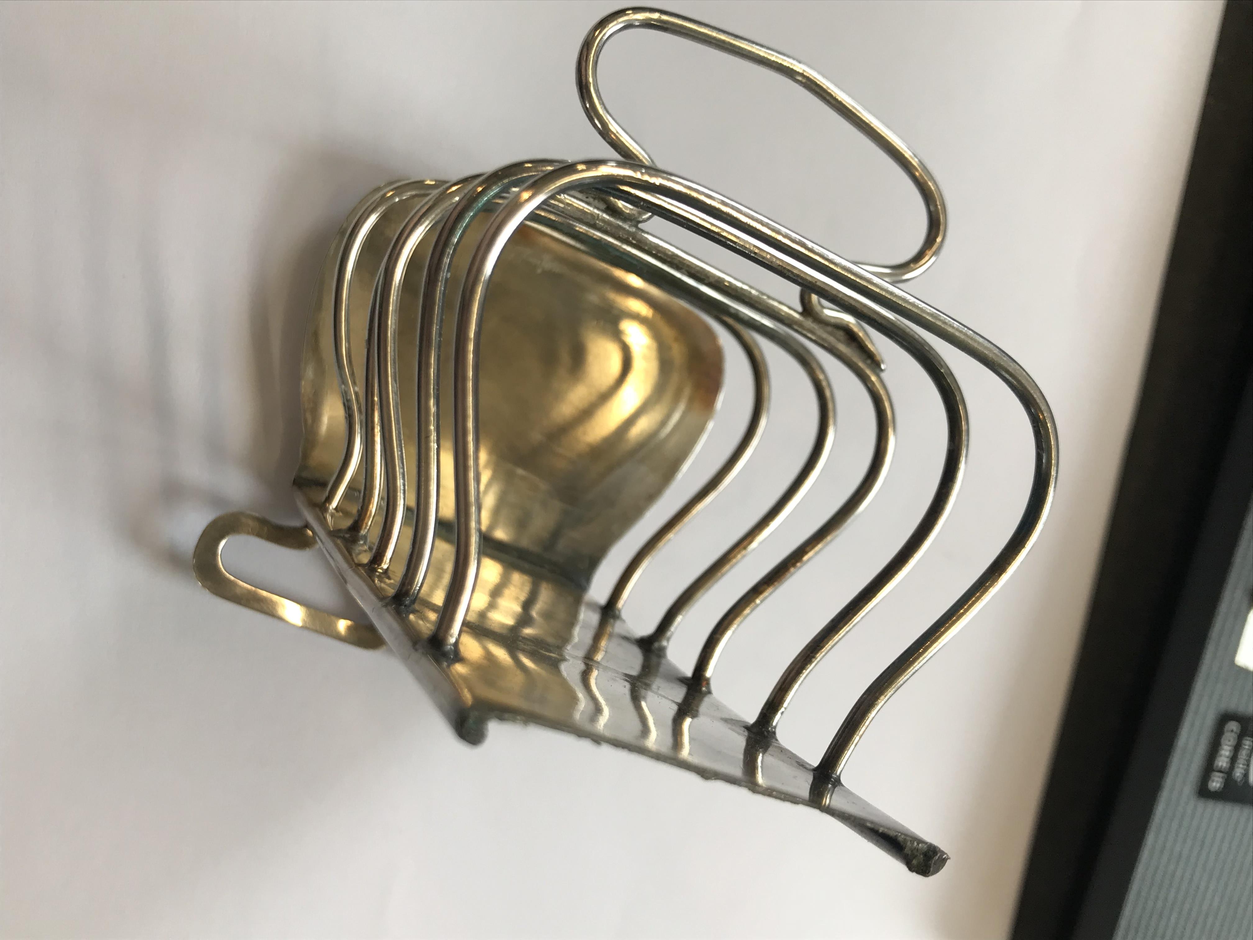 An Art Nouveau silver toast rack, Keswick School of Industrial Art, Chester 1906, the six slice rack - Image 12 of 20