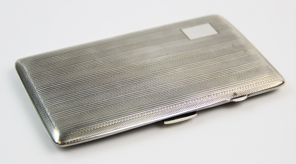 A silver cigarette case, John Rose, Birmingham 1943, of rectangular form, with striped and engine - Bild 2 aus 3