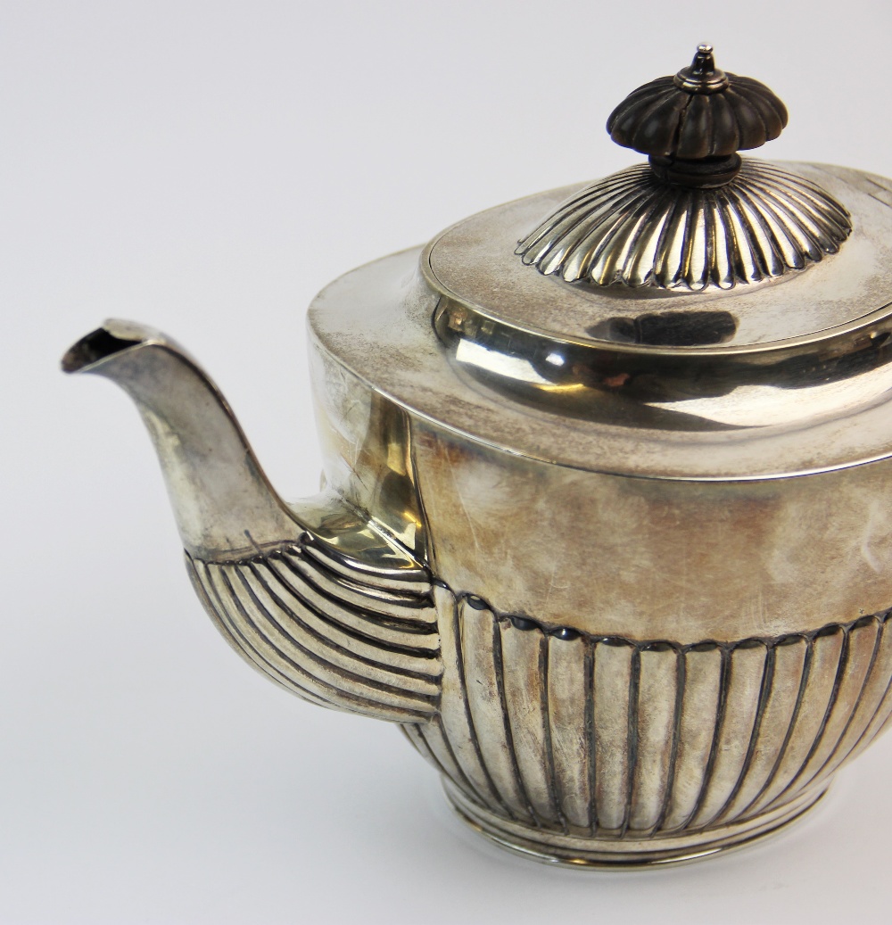 A Victorian silver teapot, Charles Stuart Harris, London 1888, of typical form, the half reeded body - Image 3 of 3