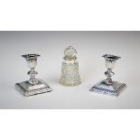 A pair of Victorian silver mounted candlesticks, William Hutton & Sons Ltd, London 1895, each with