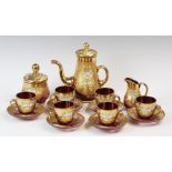A Murano Glass Trefuochi collection tea set, each half gilt cranberry glass body decorated in a