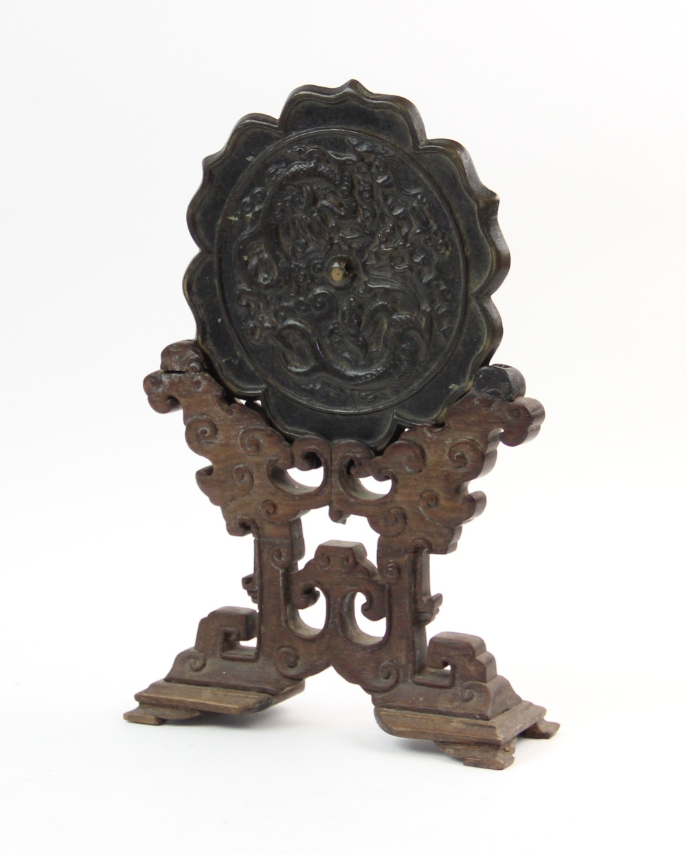 A Chinese bronze hexafoil lotus mirror, Ming dynasty, cast in relief with two confronting dragon - Image 2 of 2