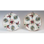 A Chinese porcelain dish, 19th century, of circular form decorated in a pattern of boys, with