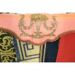 A collection of curtain pelmets, to include, a red felt pelmet with green felt detail and green