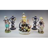 A selection of continental ceramics, comprising; a pair of Italian Majolica candle sticks, the